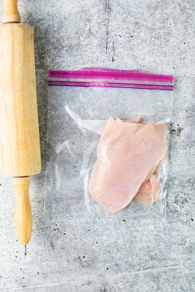 How to pound chicken breasts flat in a plastic bag.