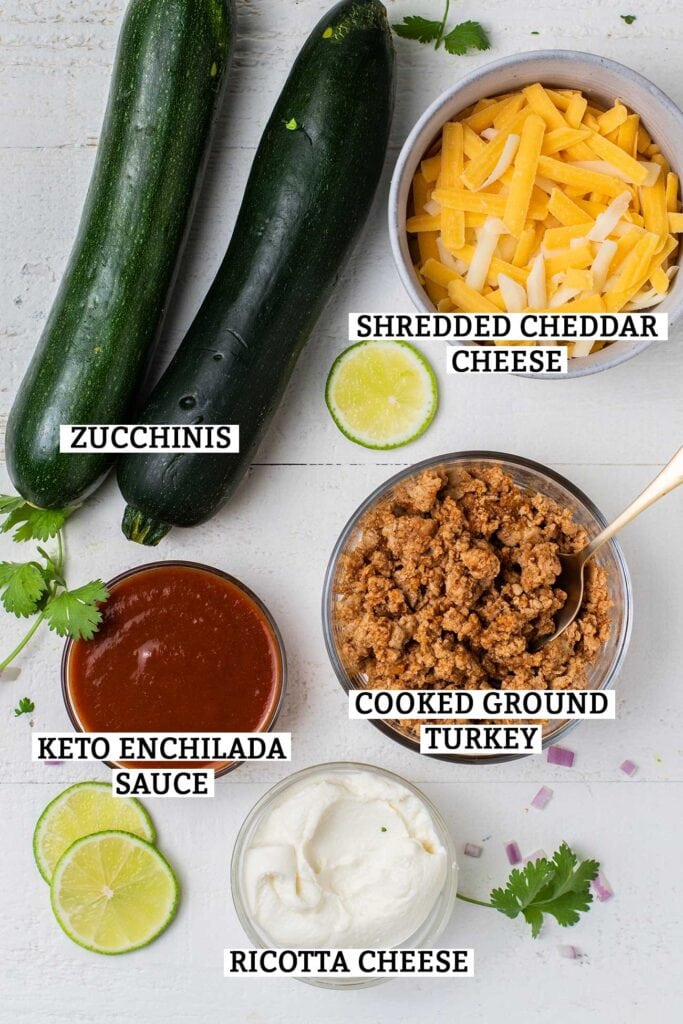 The ingredients needed to make zucchini enchilada roll ups.