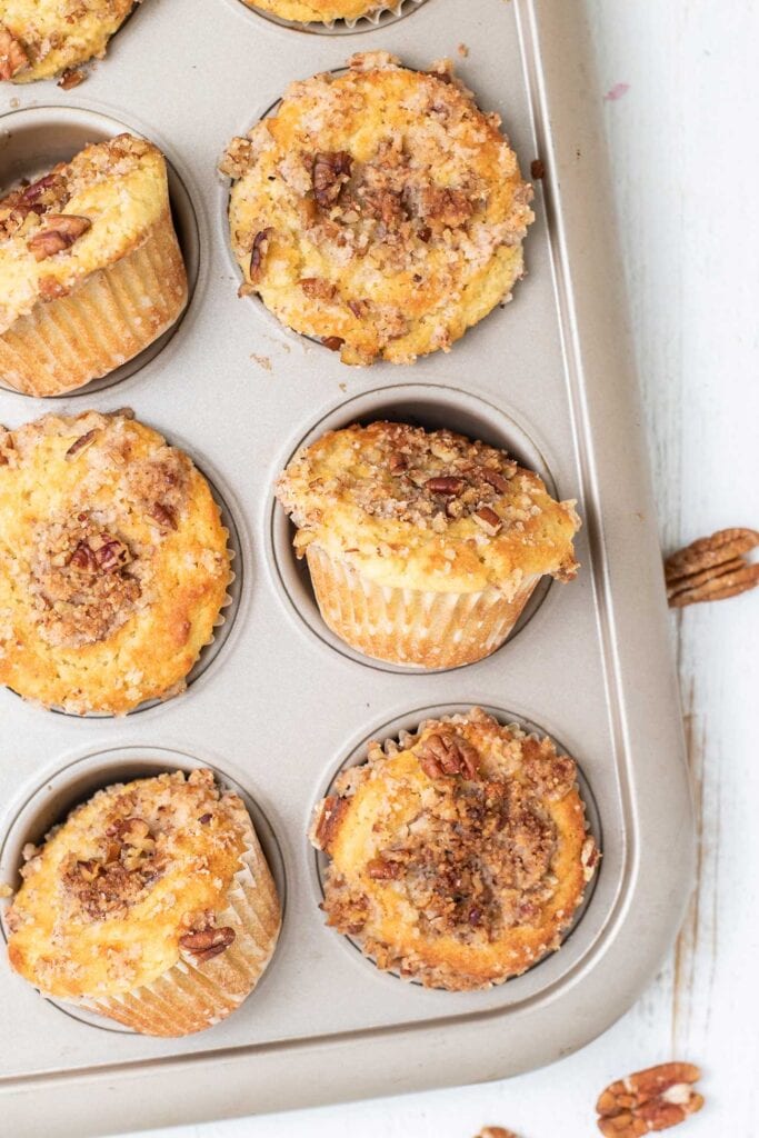 Muffins shown in a baking tin.