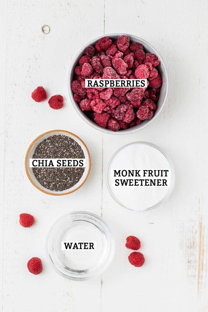 The ingredients needed to make raspberry chia jam.
