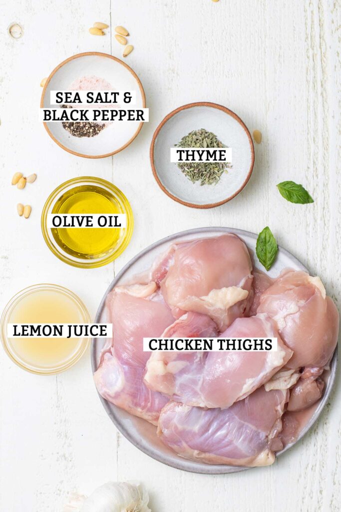 The ingredients needed to make herbed chicken thighs.