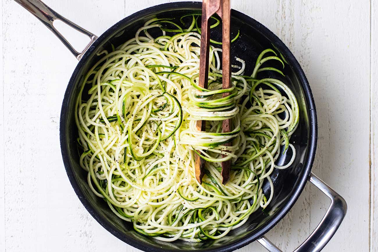 How to Make Zoodles (Zucchini Noodles!) - Blissfully Low Carb and