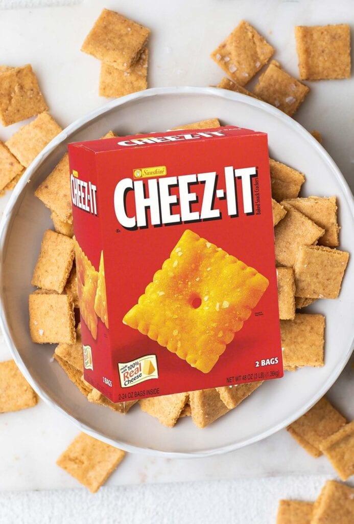 A box of Cheez Its shown with a bowl of keto cheez its.