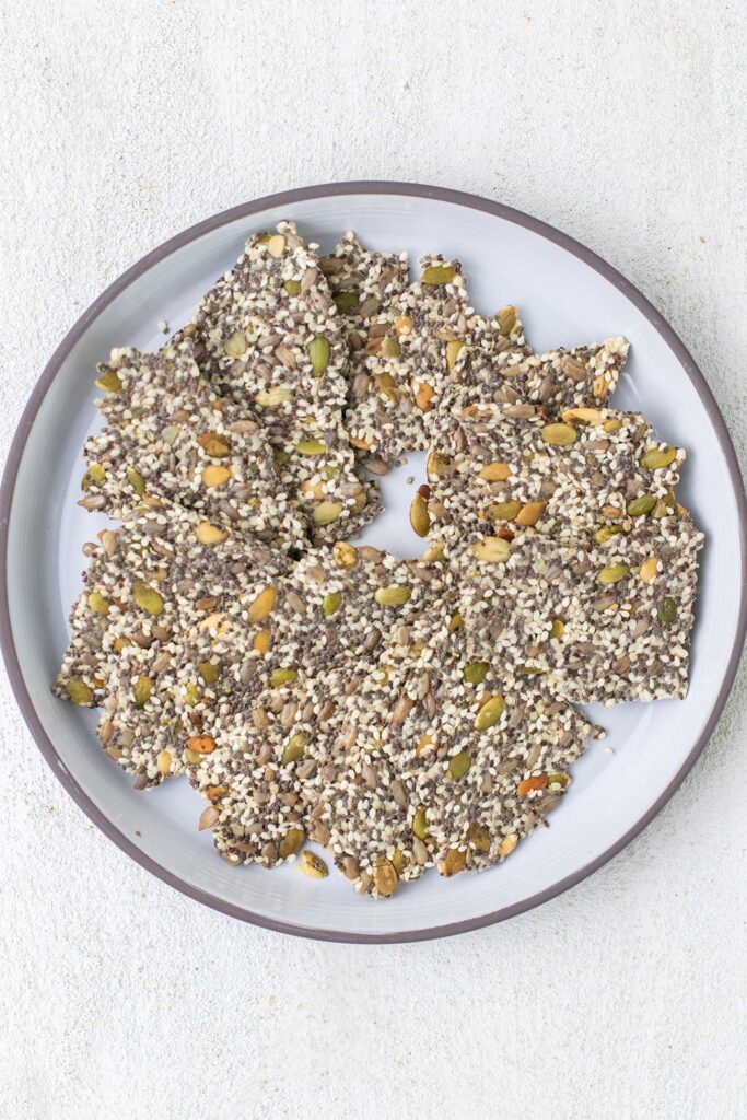 A plate with chia seed crackers.