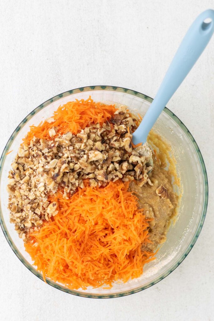 Carrots and chopped walnuts added to the cake batter.