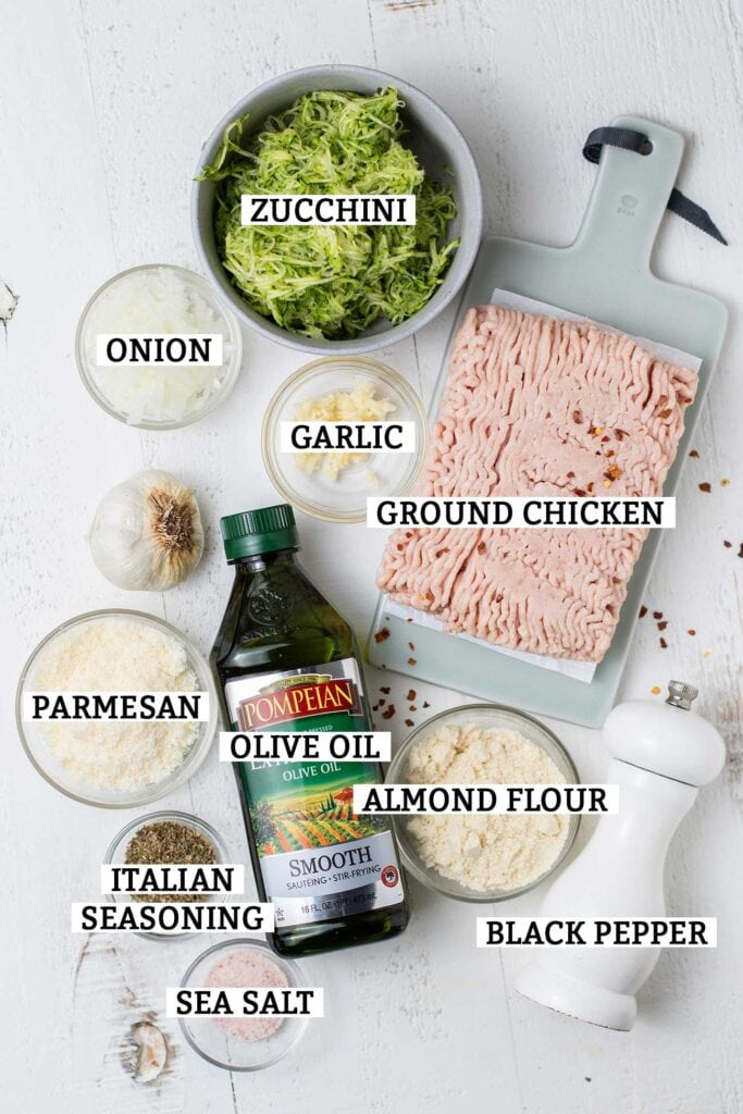 The ingredients needed to make keto chicken meatballs shown with labels.