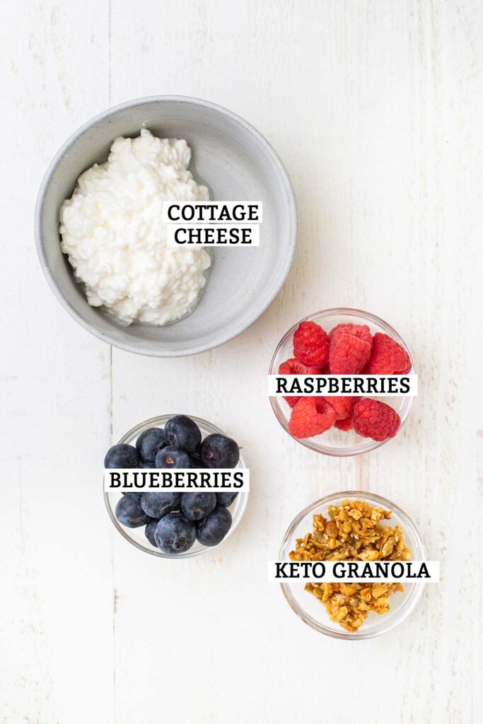 The ingredients needed for a granola cottage cheese bowl.